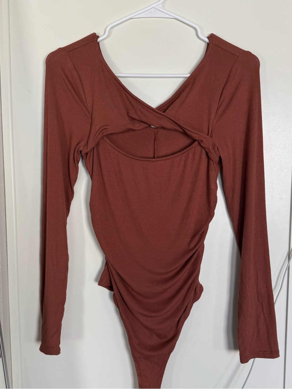 Astr Twisted Front Long Sleeve Bodysuit in Rust